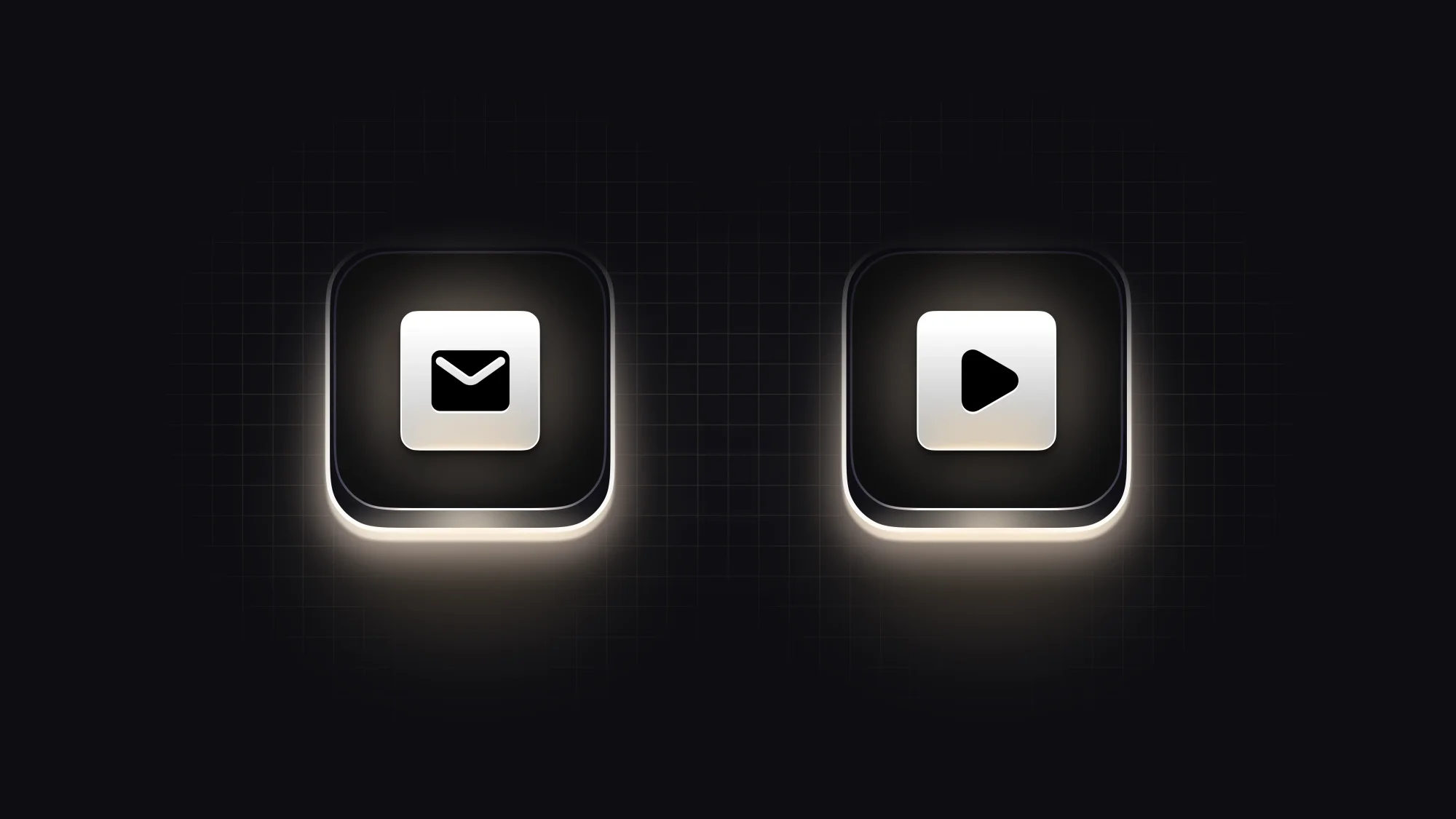 Mail and play icons on glossy black keys with a soft glow